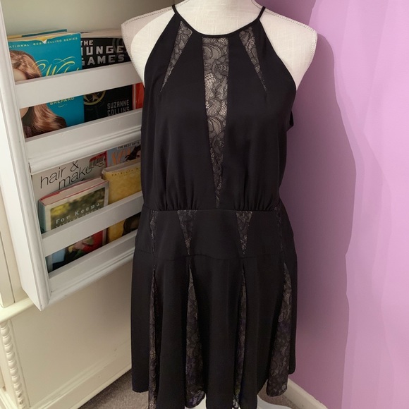 BCBGMaxAzria Dresses & Skirts - BCBG black dress with lace detailing | size 12